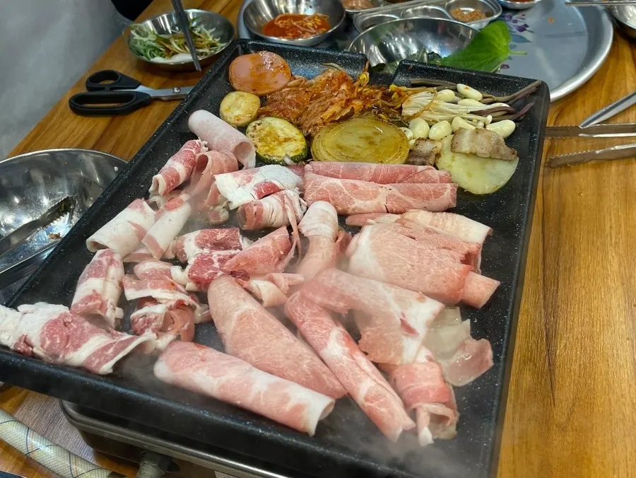 Close-up of crispy grilled shaved pork