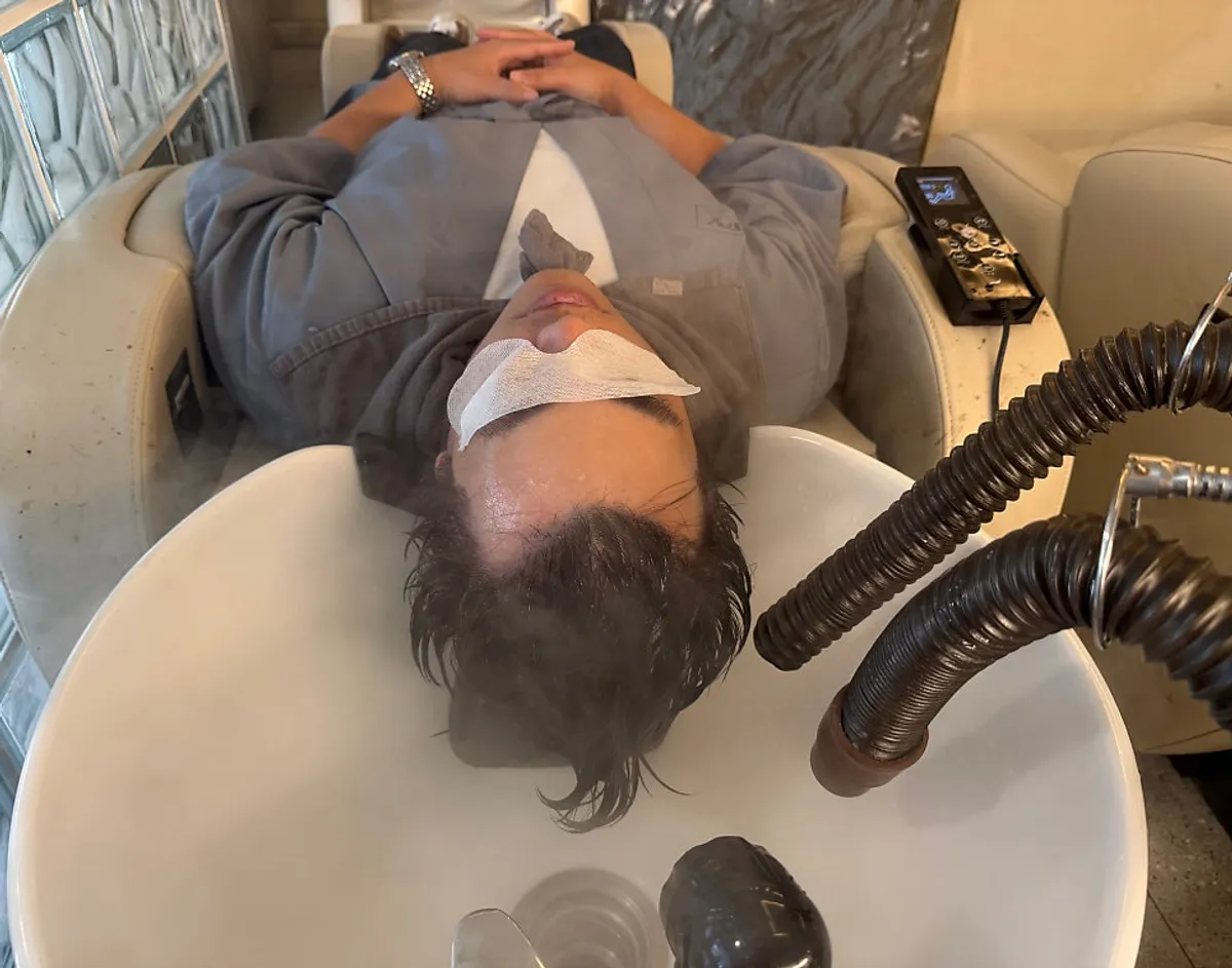 Milbon care received on the massage-chair shampoo station