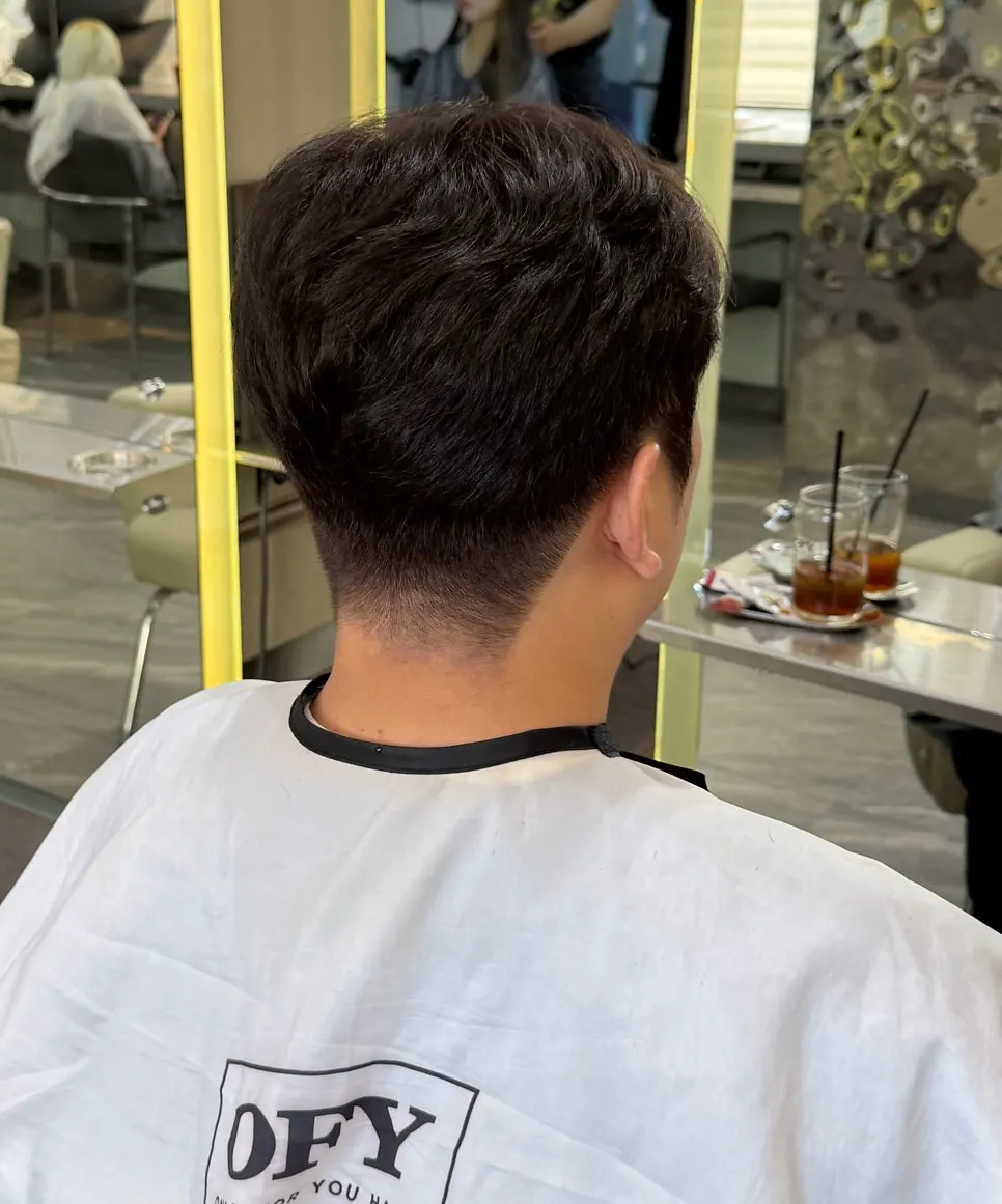 Finishing touches on flyaways during the cut