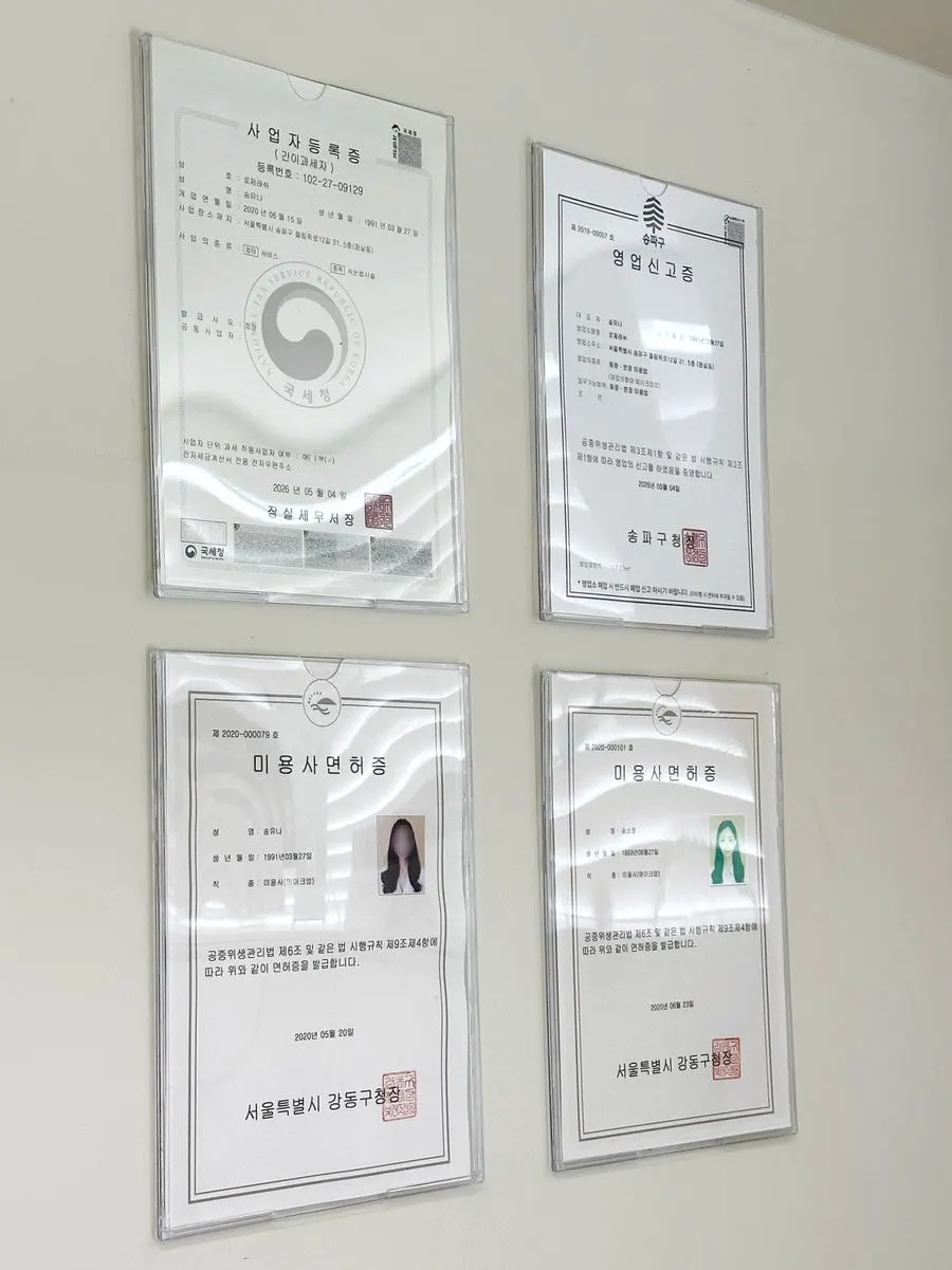Separate men's and women's restrooms inside the salon