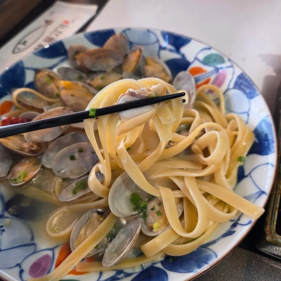 Braised dish enjoyed alongside clam pasta