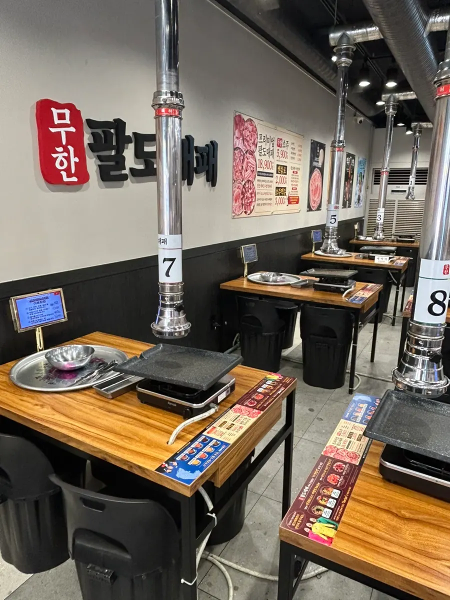 Restaurant seating stretching out around the all-you-can-eat corner