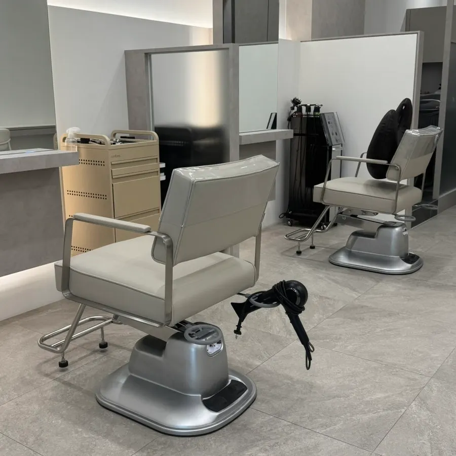 Seating in Abidasun Salon's waiting area