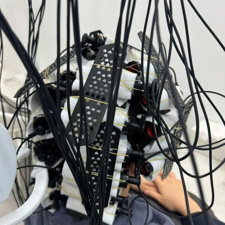 The assigned designer personally handling the perm process