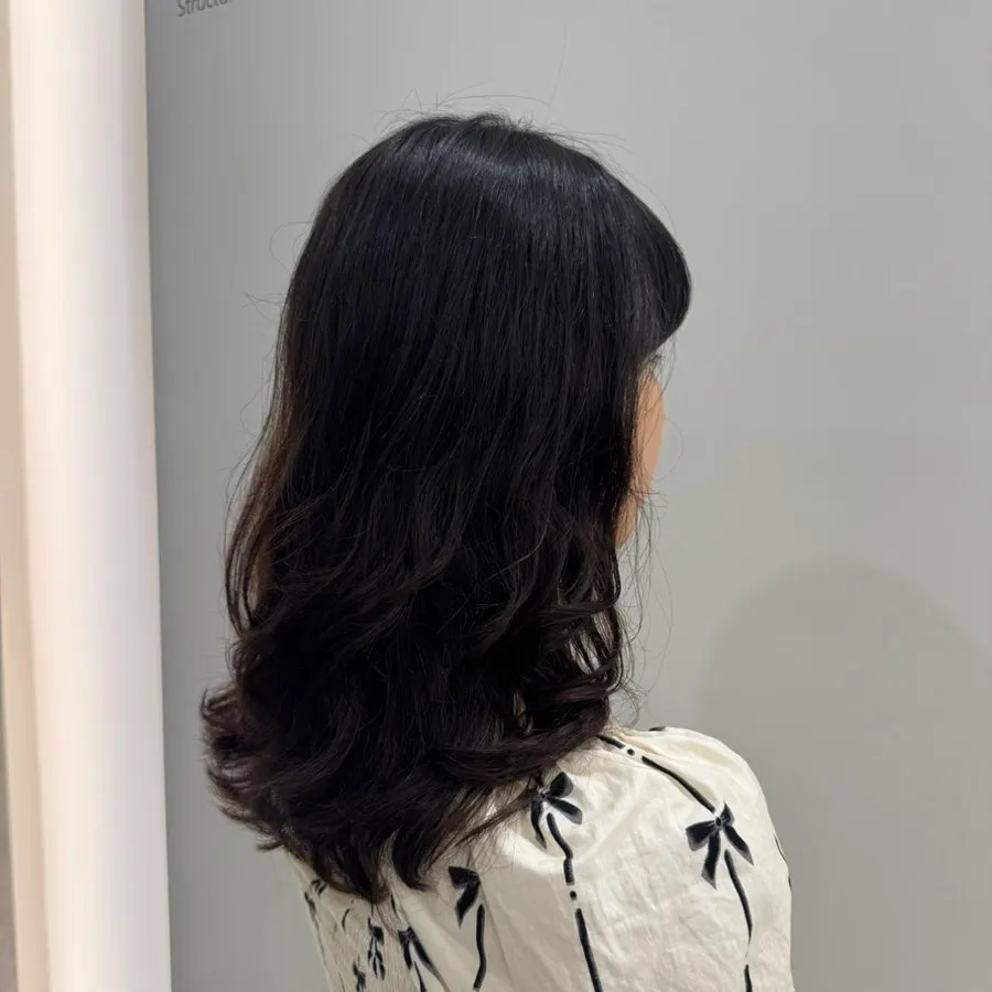 Calmer curls after the premium heat perm