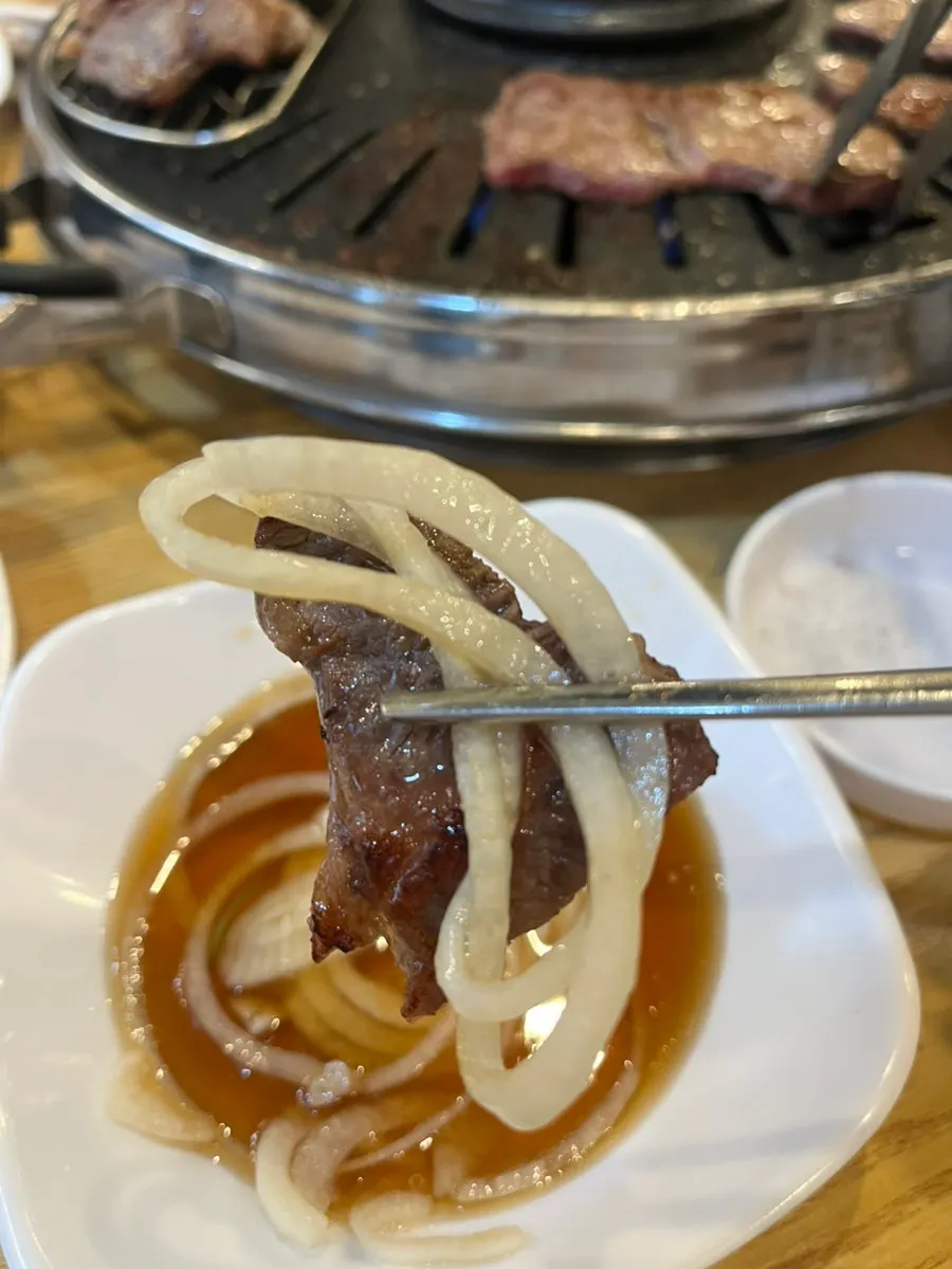 Grilled beef with pickled onion