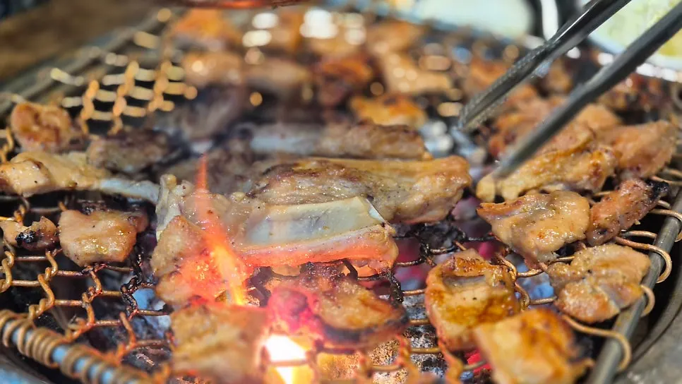 Charcoal-grilled pork rib meal spread