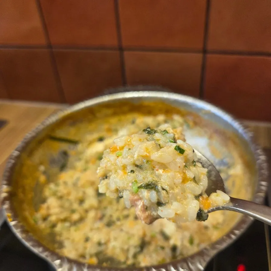 Finished egg porridge with soft, fluffy egg curds