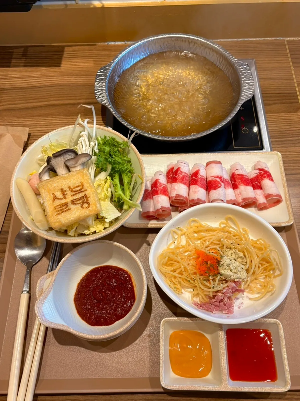 A full spread of solo-pot shabu-shabu at Shabu Torang in Jang-an-dong