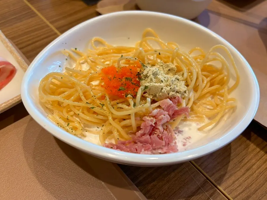 Adding cream pasta into the spicy broth