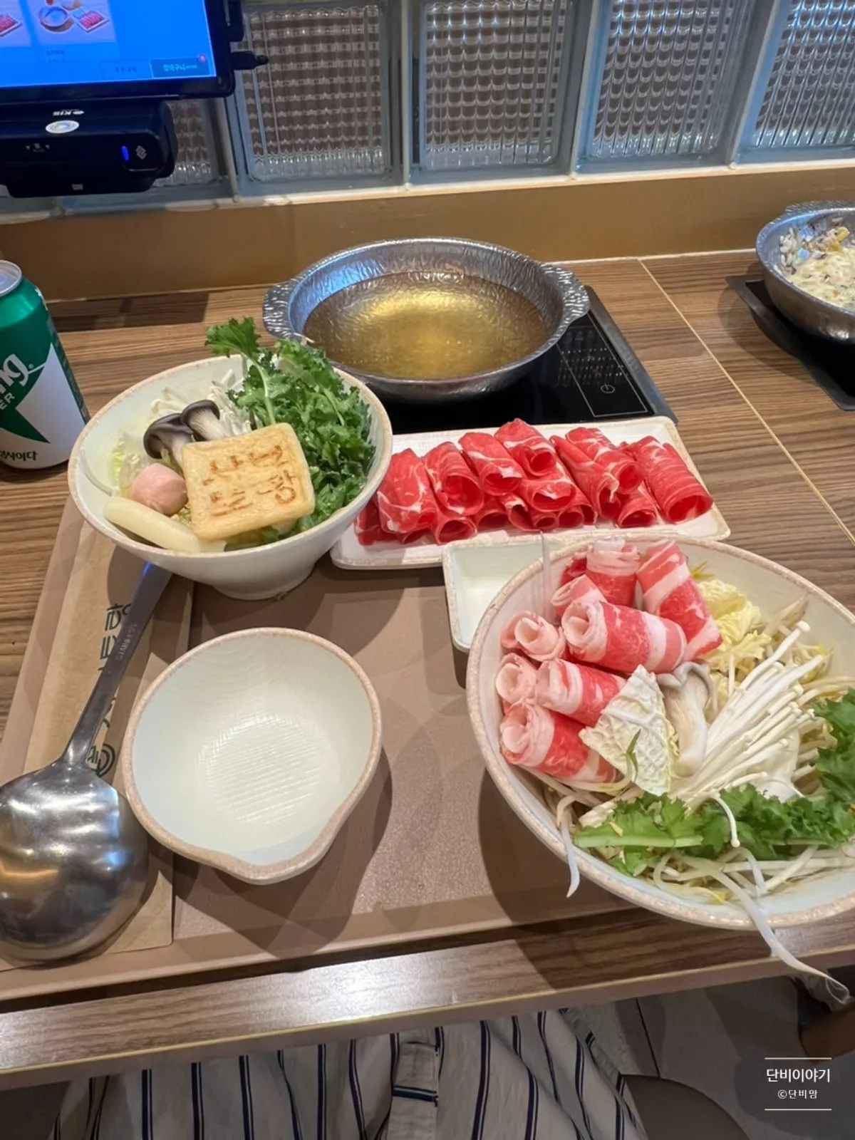 A solo shabu-shabu spread set up at an induction seat