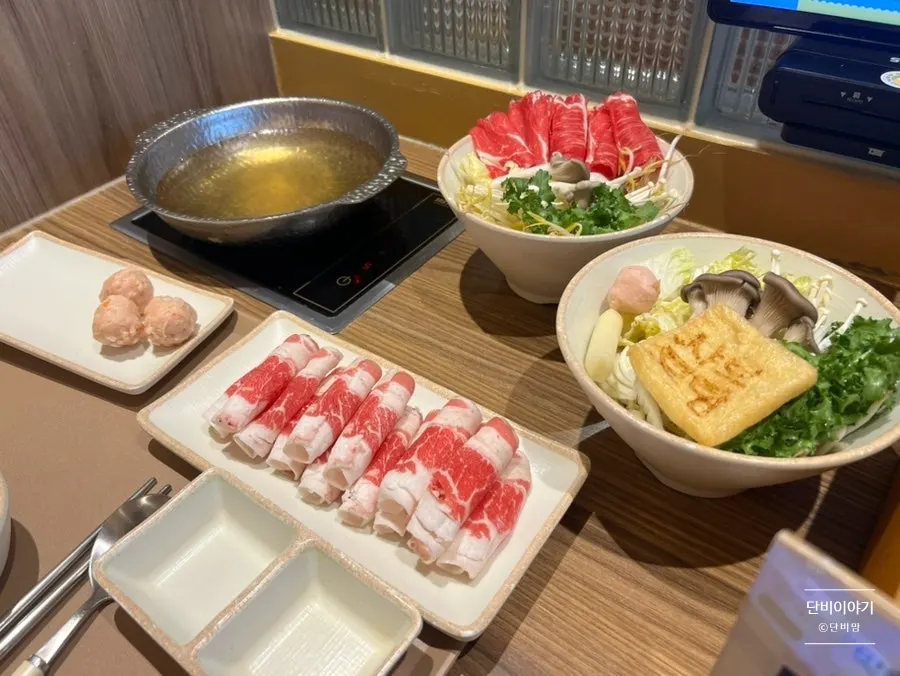 Solo shabu-shabu setup with added vegetables and beef brisket