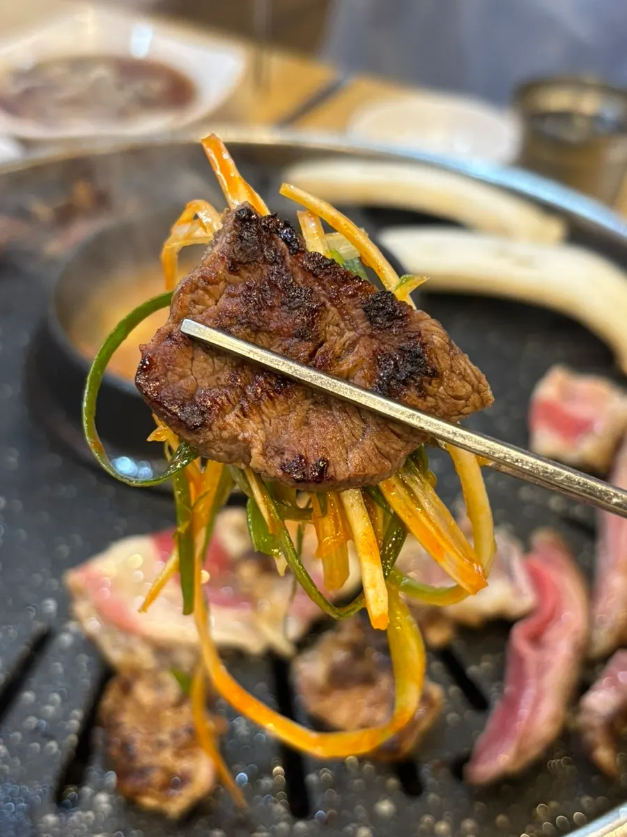 Grilled beef served with side dishes