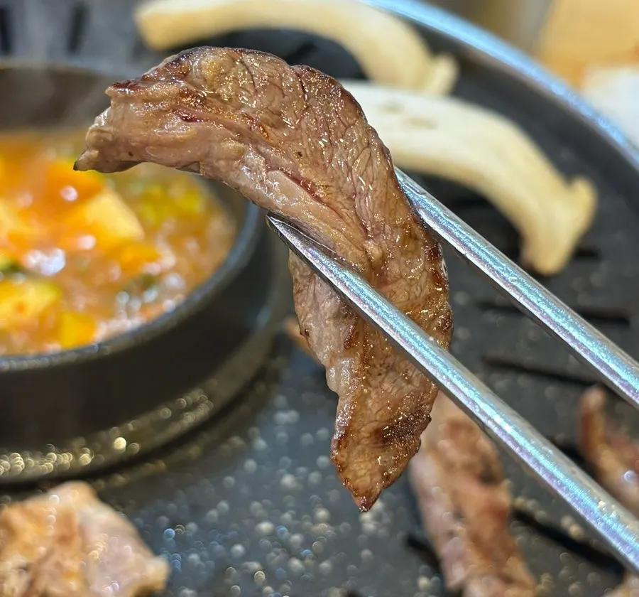 Beef wrapped with pickled onion and seasoned green onion