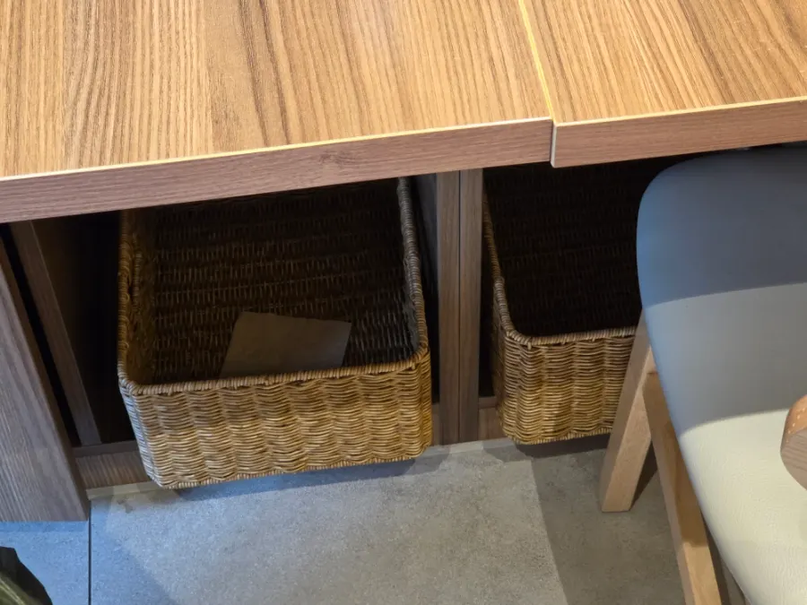 Basket for belongings under the table