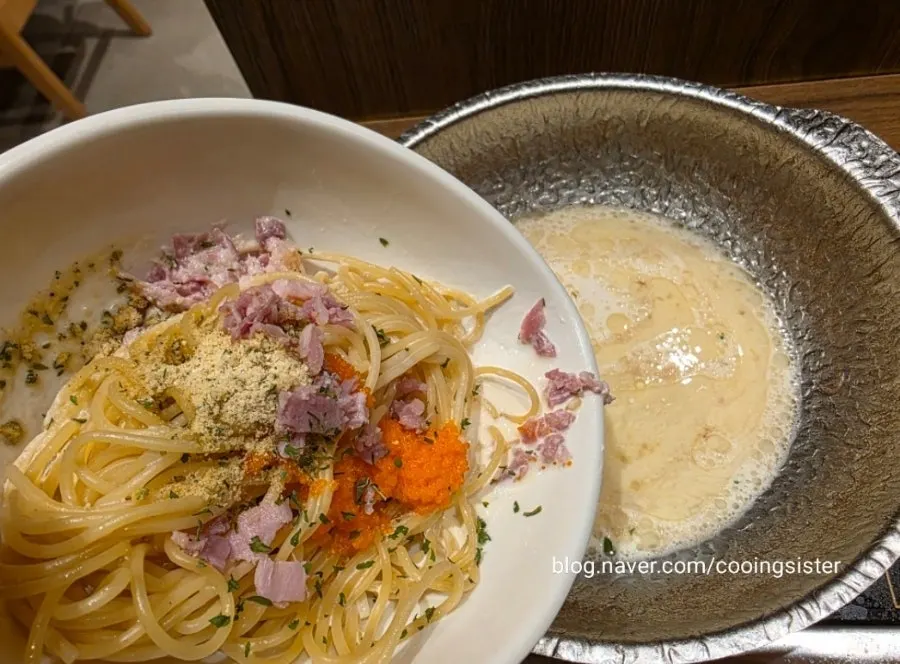 Adding pasta noodles to the reduced broth