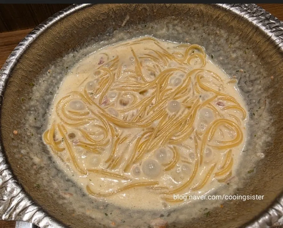 Cream pasta simmering in the shabu broth
