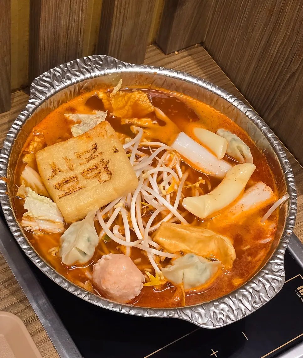 Spicy shabu-shabu broth with extra ingredients