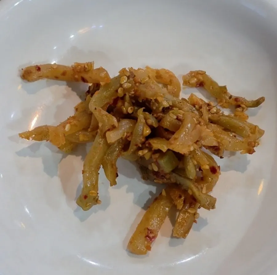 Plate of side dishes refillable at the self-serve corner