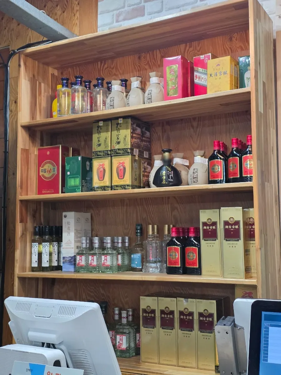 Various Chinese liquors displayed at the counter