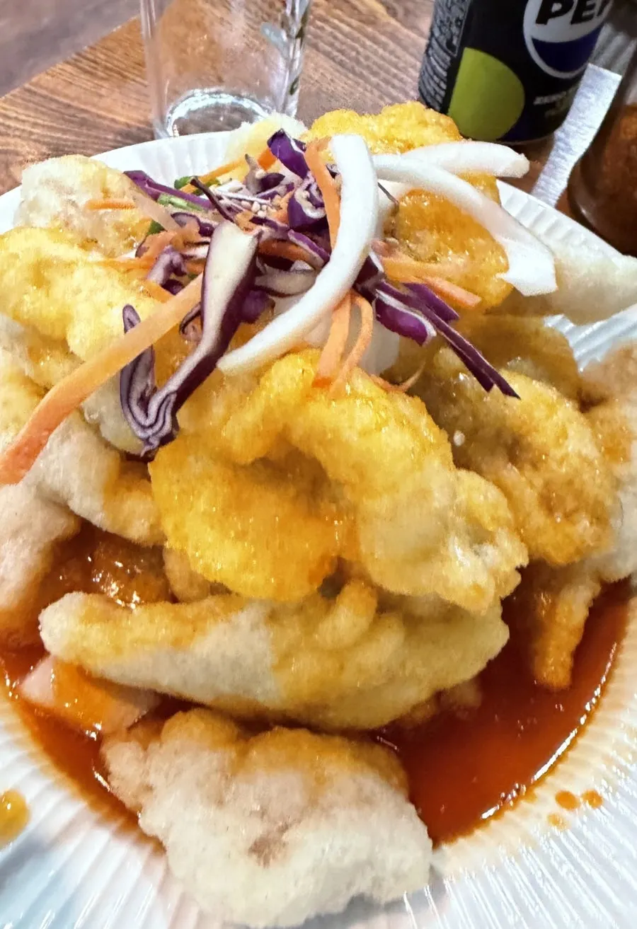 A plate of guobaorou with plenty of sauce