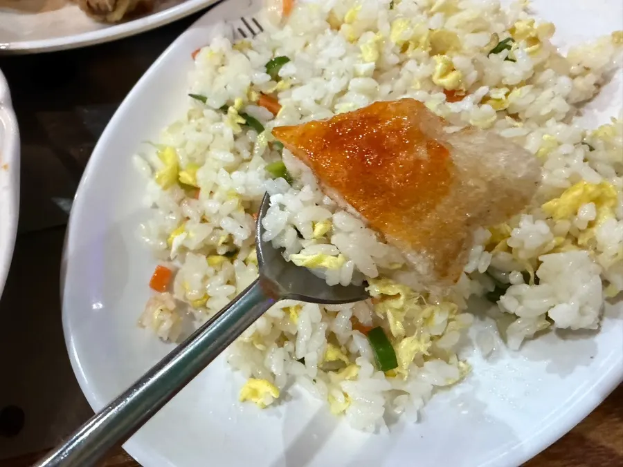 Guobaorou piled on top of fried rice