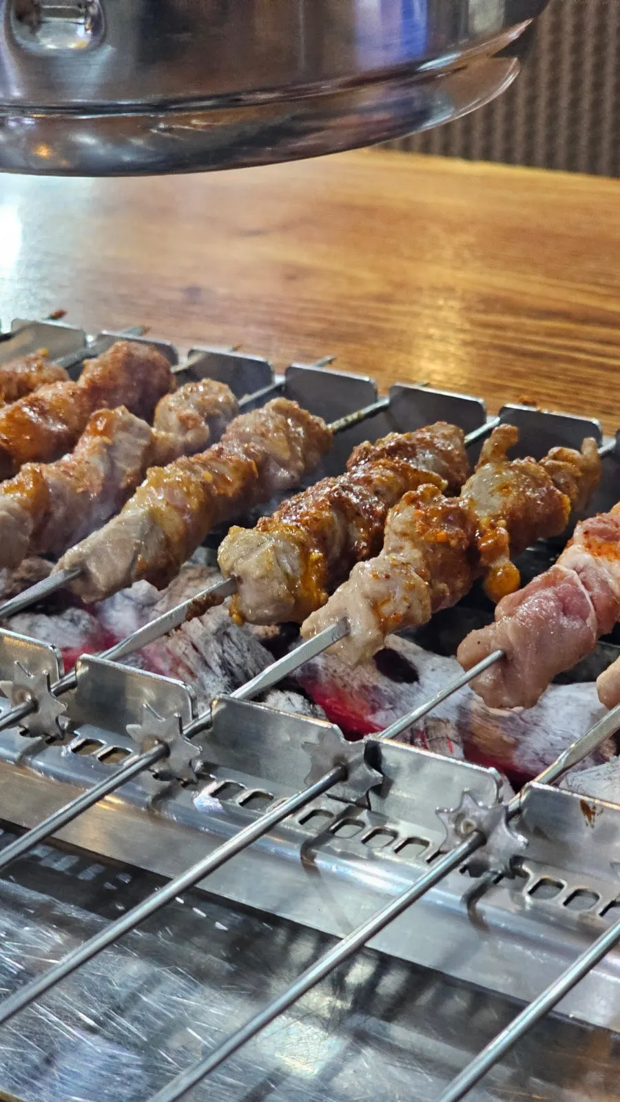 Jangbaeksan lamb skewers grilled with a smoky char