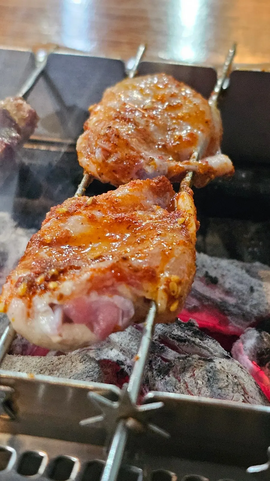 Lamb skewers being grilled