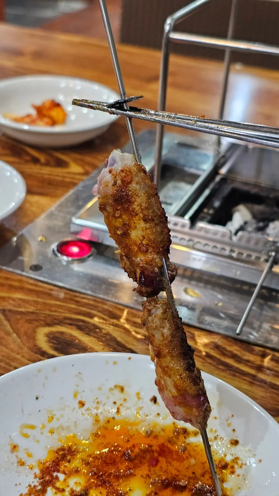 A plate of lamb skewers at Jangbaeksan Yangkkochi Songjeong