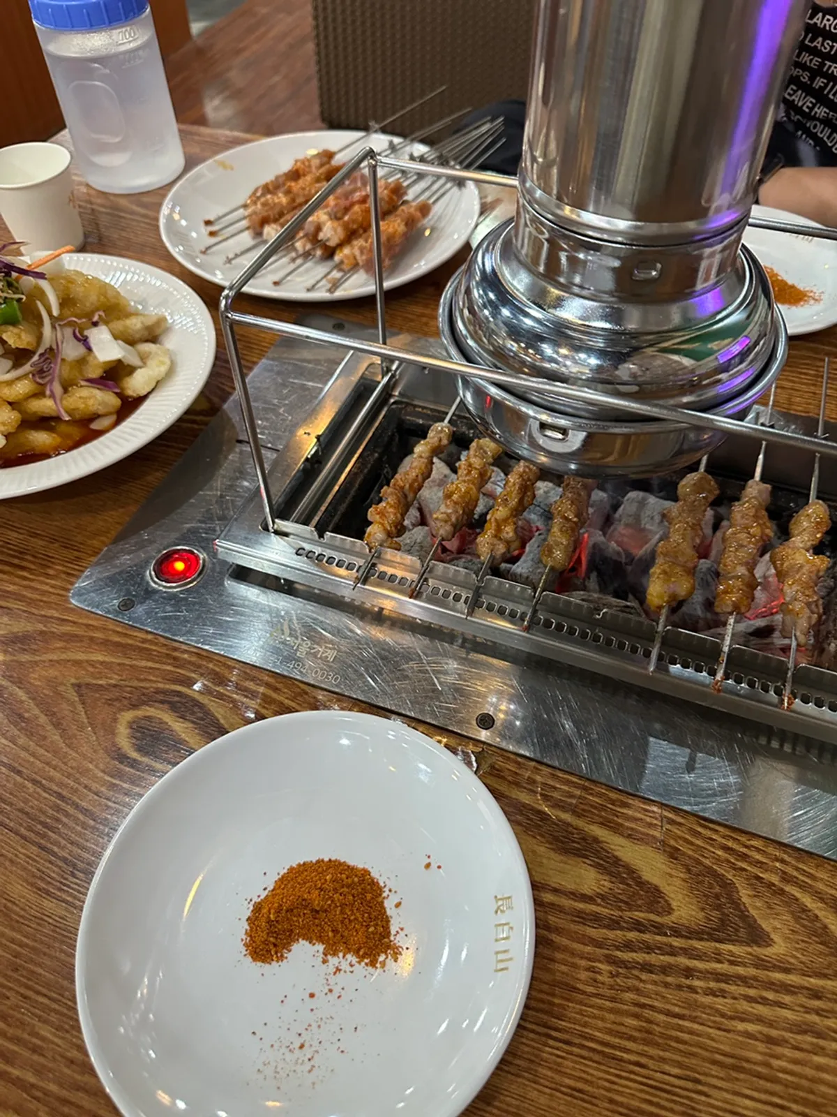 Table setting of lamb skewers at Jangbaeksan Yangkkochi Songjeong