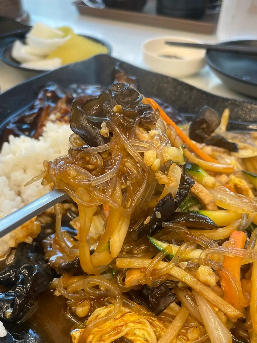 Japchaebap with rice and glass noodles mixed together