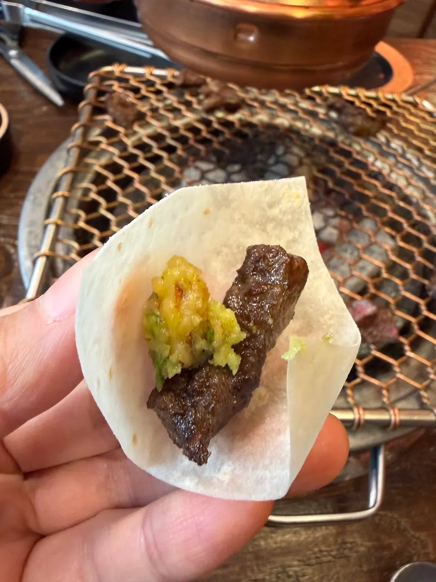 Marinated beef rib placed on the charcoal grill