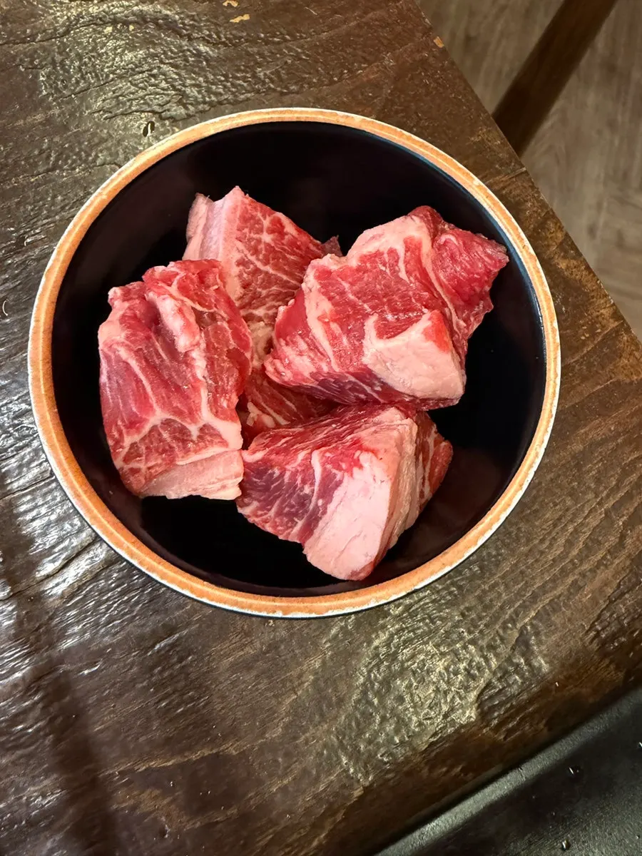 A grilled piece of marinated beef rib
