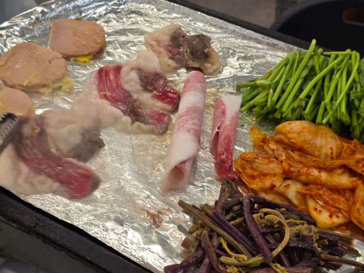 Grill set up by staff with the combo meat