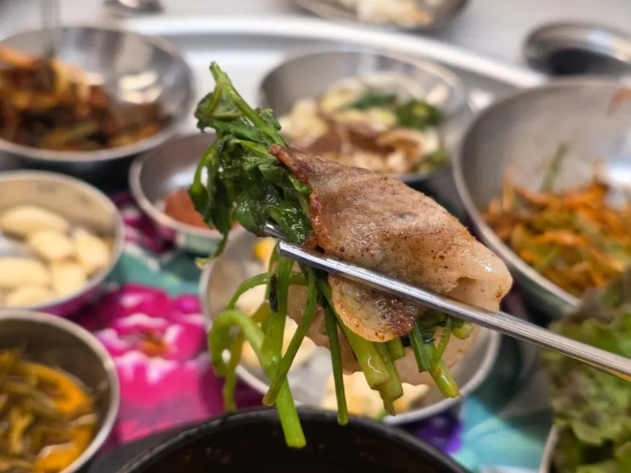 Minari and pork belly wrap dipped in onion soy sauce