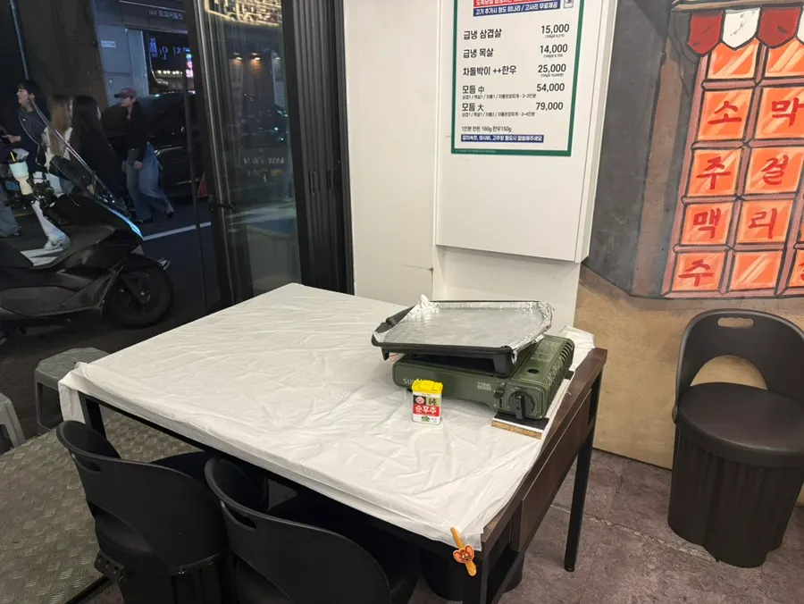 BBQ table lined with plastic hygiene sheet