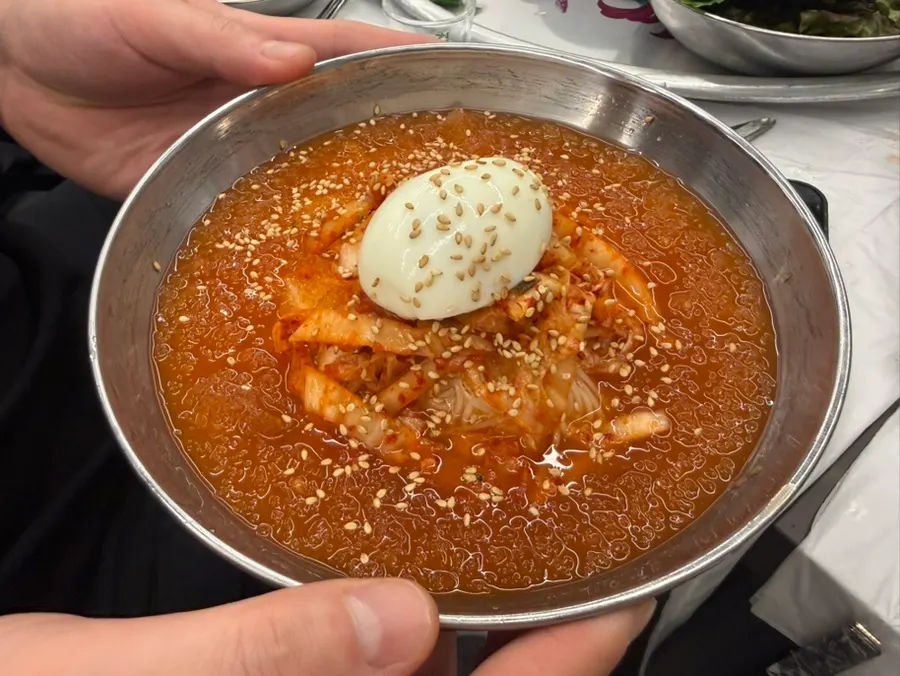 Kimchi noodle soup topped with shaved ice