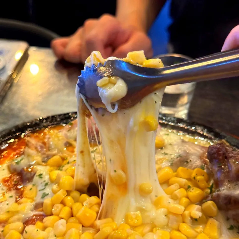 Cheese stretching from the chicken