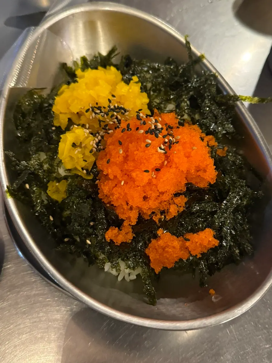 Hand-shaped rice balls and basic side dishes