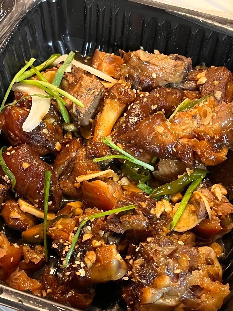 Garlic jokbal topped with garlic bits