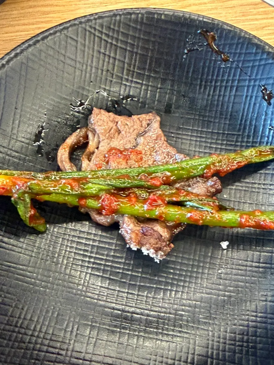 Hanwoo rolled up with green onion kimchi