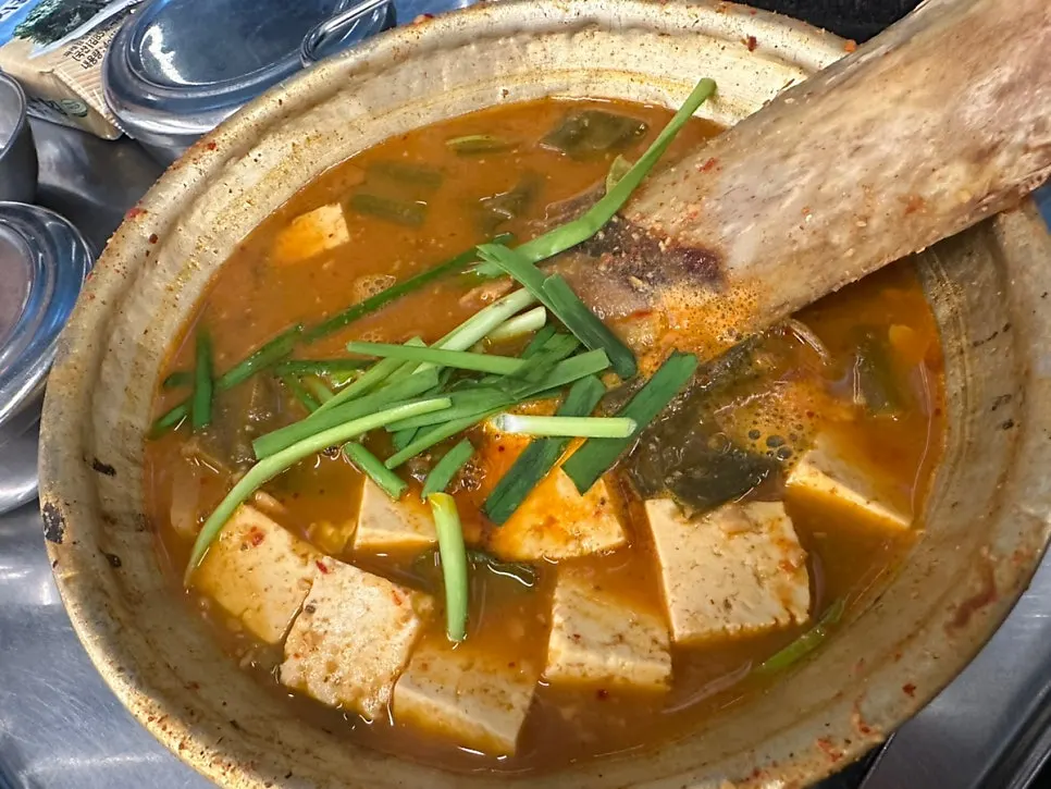 Inside of the doenjang jjigae, full of tofu and hanwoo