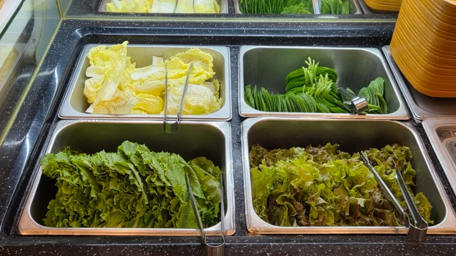 Lettuce wraps and side dishes at the self-bar