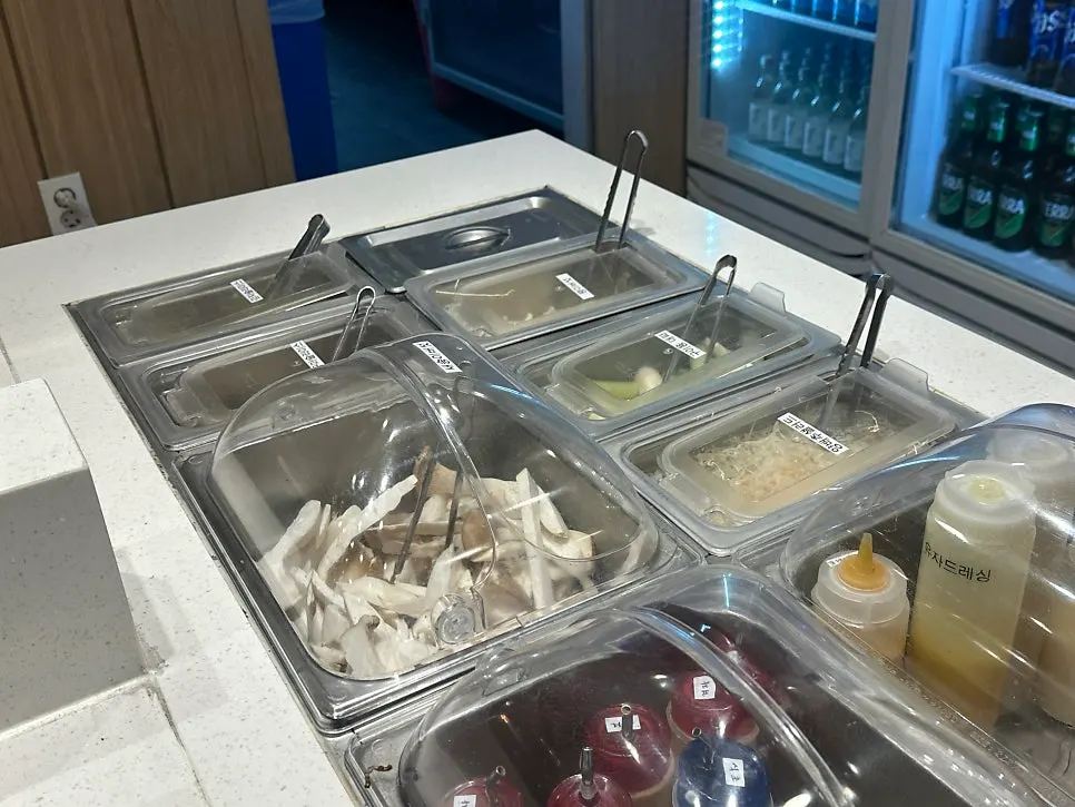 Side dishes on a stainless steel tray