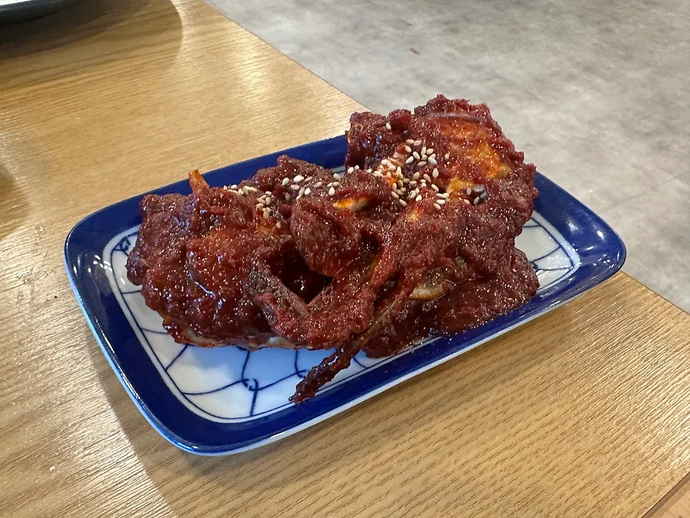 Seasoned crab topped with sesame seeds