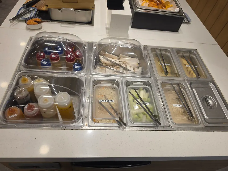 Cabbage salad and vegetable corner at the self-serve bar