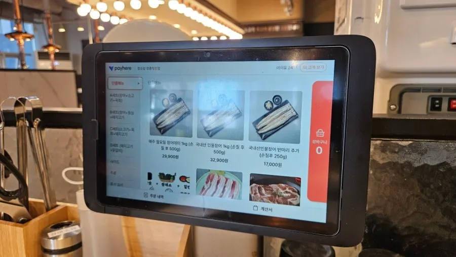 Menu board showing all-you-can-eat course prices