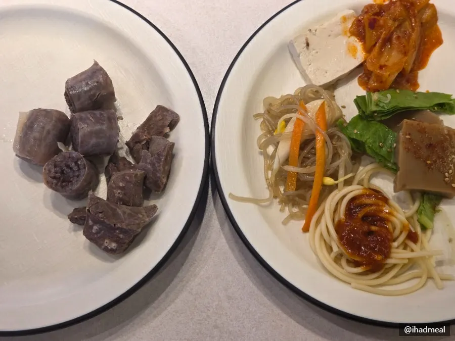 A plate of self-bar side dishes brought to the table
