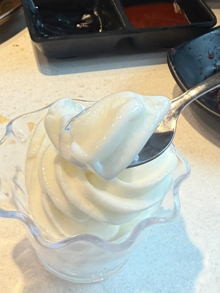 A generous scoop of soft-serve ice cream