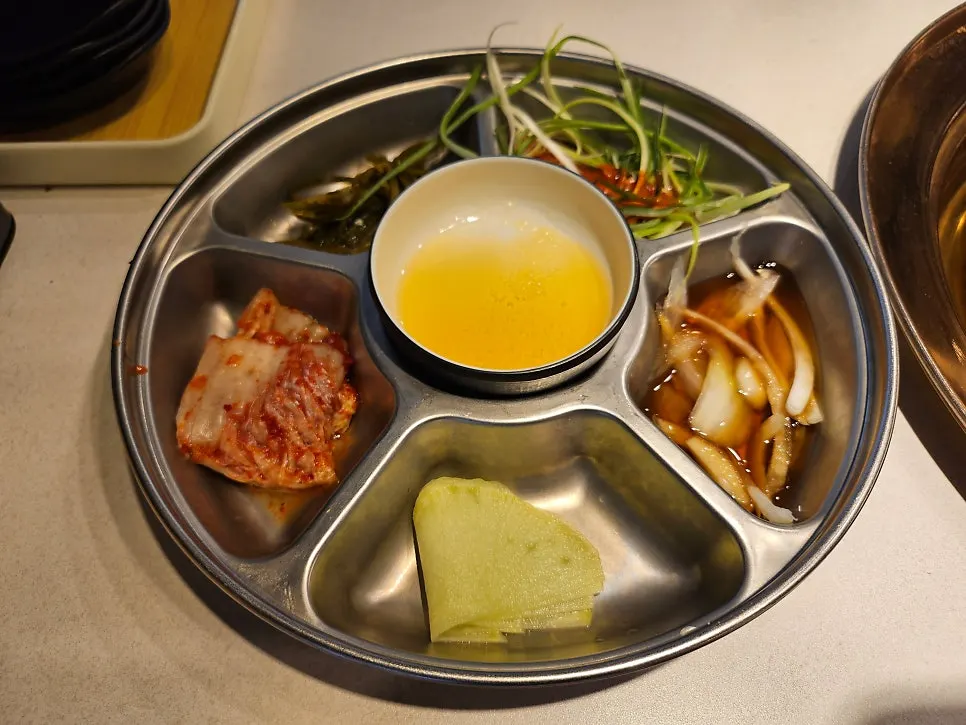 Sauce station with spicy sauce, onion sauce, and other seasonings